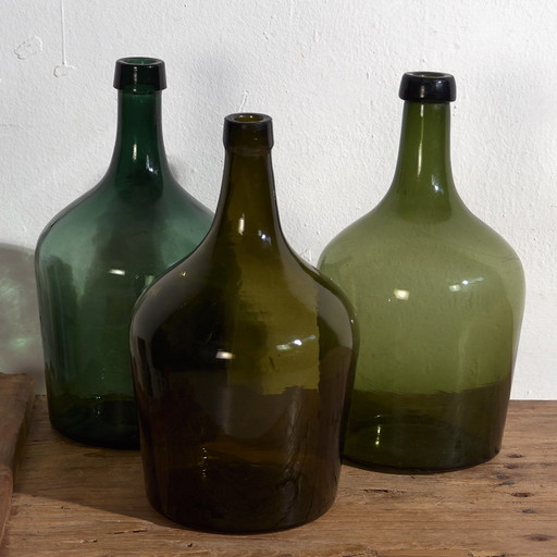 Antique green demijohns (c.1920). Set of 3 pieces #23