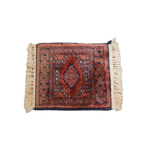 Petit tapis ornemental 38x30cm