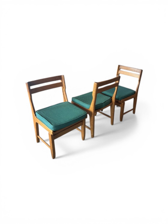 Image 1 of Set van 6 eikenhouten stoelen "Raphaël" van Guillerme & Chambron voor uw huis.