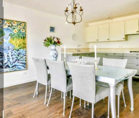 Image 1 of Mesa de comedor de cristal con 6 sillas.