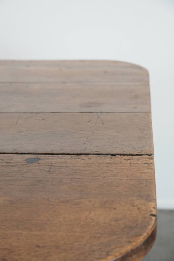 Image 1 of Antique 6 to 8 person dining table with two functional drawers