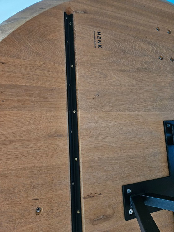Image 1 of Studio Henk Round Dining Table 160cm Oak with Black Metal Butterfly Base