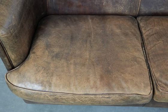 Image 1 of Vintage 2 zits bank gemaakt van cognac kleurig schapenleer in Engelse stijl