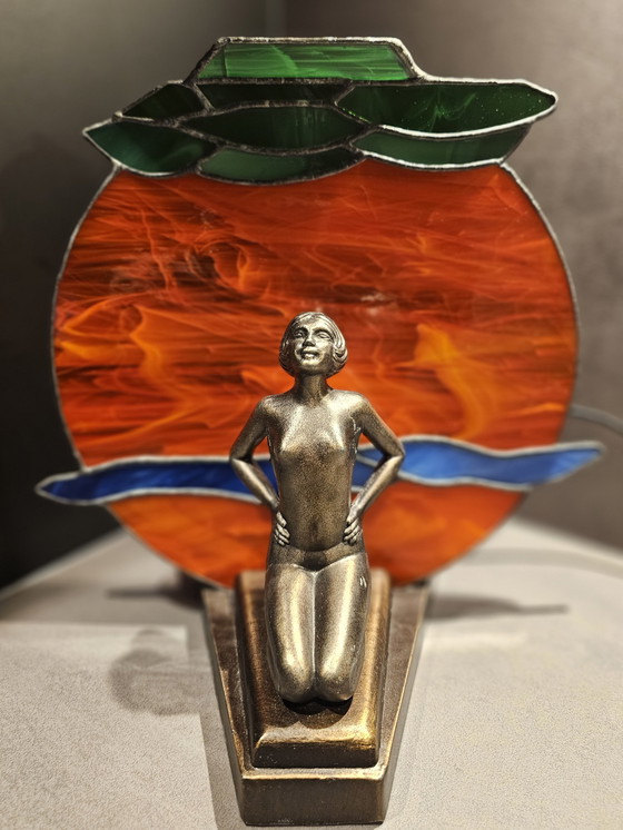 Image 1 of Art Deco lamp MCM 1960, probably bronze with Tiffany style glass shade.