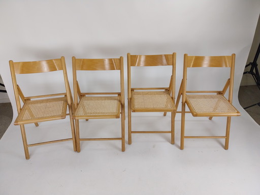 4 x chaises pliantes Mid Century en hêtre avec assise en sangle de rotin