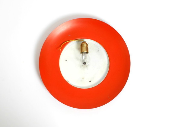 Image 1 of Grote Mid Century wand- of plafondlamp van glas met metalen reflector in rood van Kaiser Leuchten
