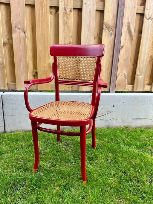 Vintage design stoel – rood & rotan – gerestyld door Ontwerpstudio Anna