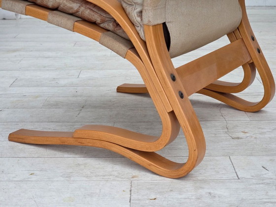 Image 1 of Noorse fauteuil uit de jaren 70, model "Kengu", beige meubelleer.
