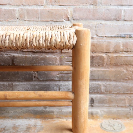 Image 1 of https://www.meutt.nl/a-109283495/fauteuils-stoelen/vintage-oud-bankje-rieten-zitting-hal/