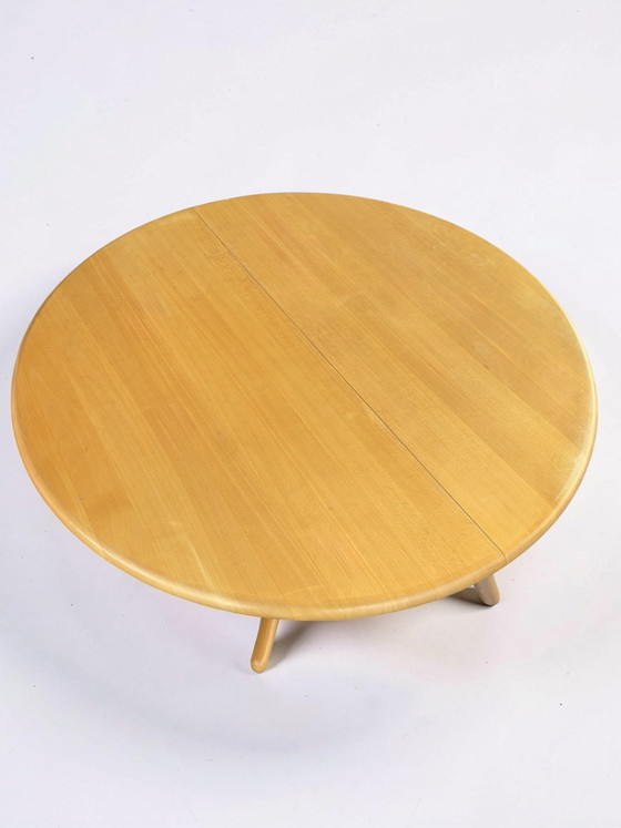 Image 1 of Extendable round Danish dining table