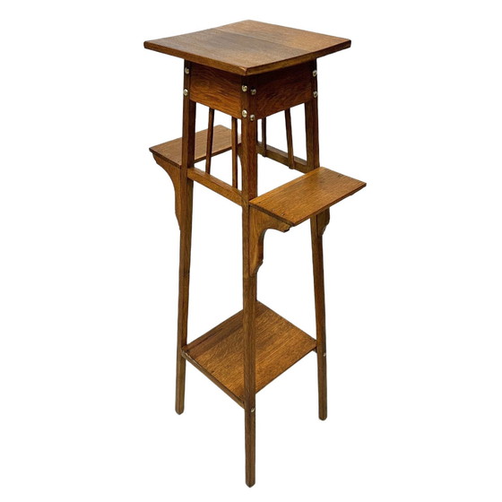 Image 1 of Antique Art and Crafts pedestal plant table with side shelves, oak, 1890s