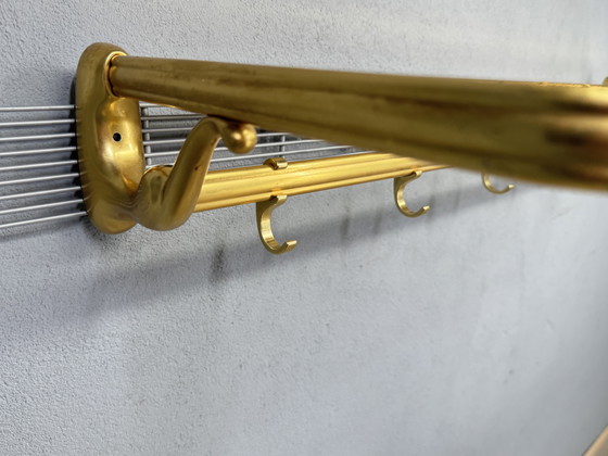 Image 1 of Vintage metalen wandkapstok met touw