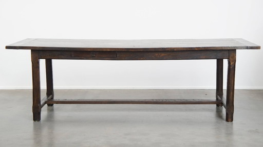 Long antique English elm dining table from early 19th century