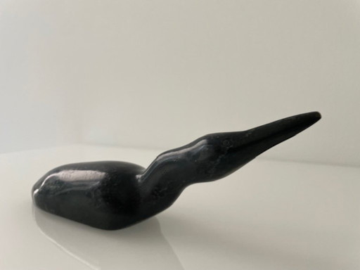 Inuit sculpture of an ice diver in serpentine stone