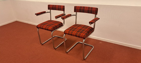 Image 1 of Ensemble de 2 chaises tubulaires avec accoudoirs | style rétro | rouge