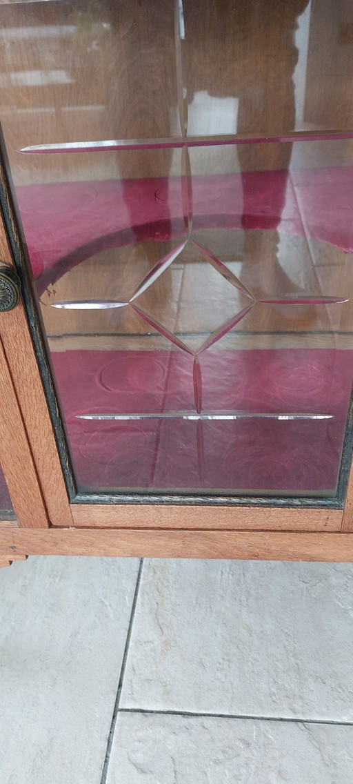 Beautiful antique tea cabinet with cut glass