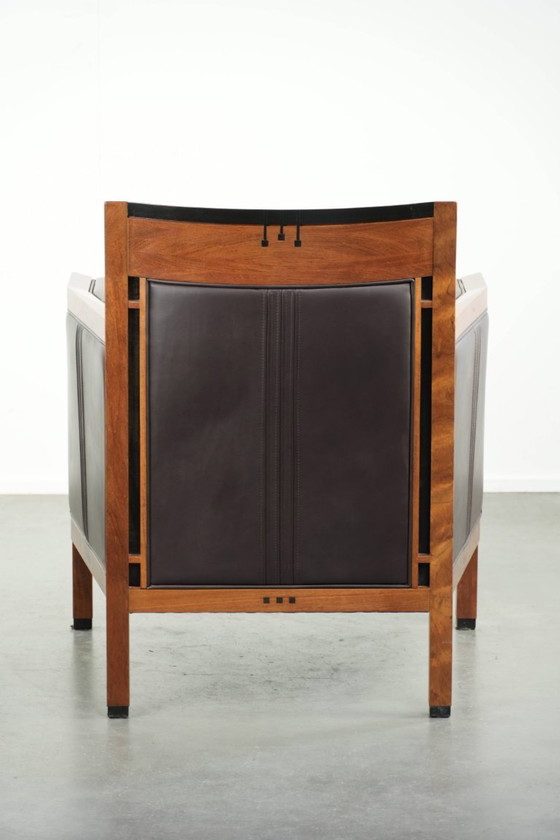 Image 1 of Luxe Schuitema Art Deco design set bestaande uit een fauteuil en hocker uit de Decoforma serie in chocolade bruin rundleer