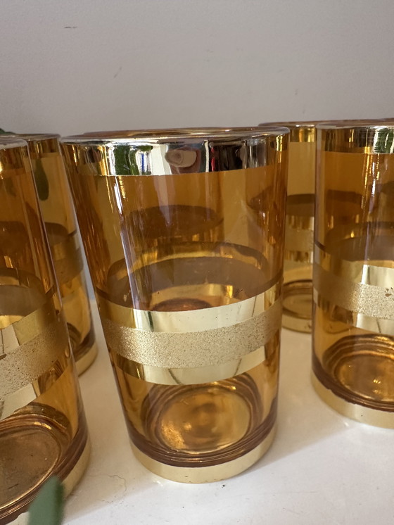 Image 1 of Set of 8 gold/amber colored glasses