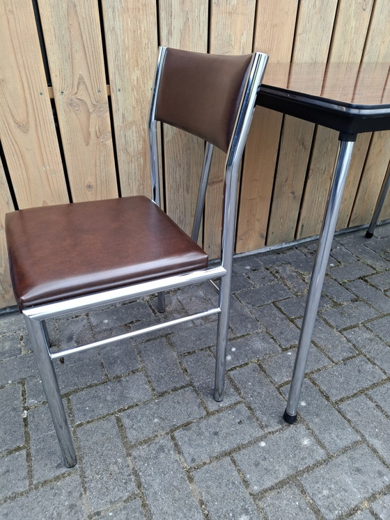 Image 1 of Vintage kitchen table with 2 chairs. 1960s