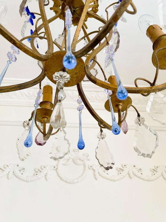 Image 1 of Lampadario antico a gabbia in bronzo dorato, con luce in cristallo di Murano color zaffiro.