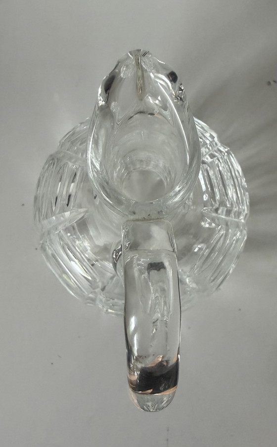 Image 1 of Karan en cristal rond avec main à