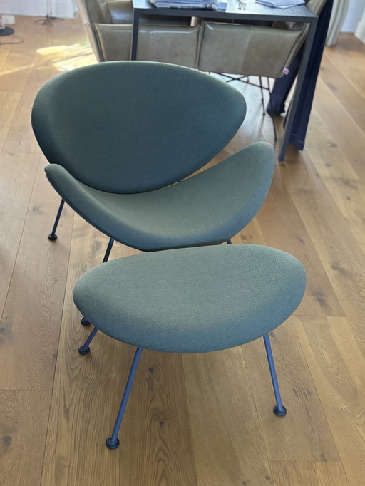 Artifort Orange Slice armchair and footstool in green