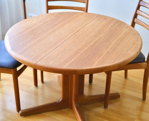 Solid teak dining table