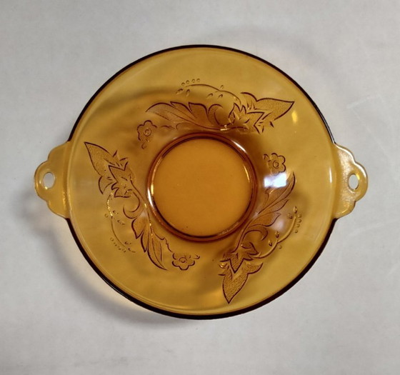 Image 1 of ciotola in vetro ambrato vintage con orecchie