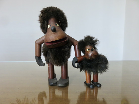 Image 1 of 2 hommes des cavernes en teck, années 60 70