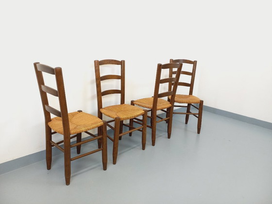 Image 1 of Set van 4 vintage brutalistische stoelen van hout en stro uit de jaren 60.