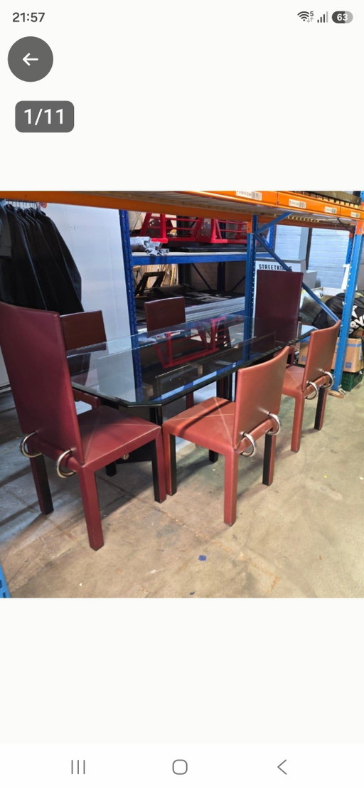 Beautiful B&B Italia Arcadia dining table with glass top and 6 matching chairs, designed by Paolo Piva. – eetkamerset