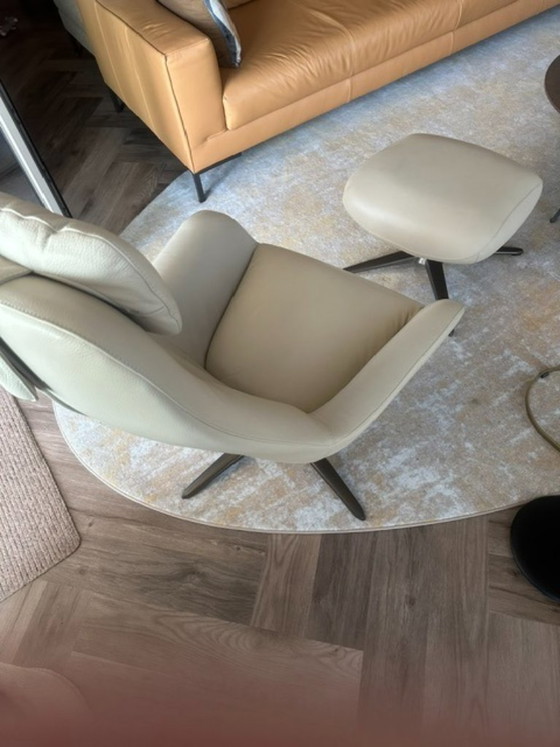 Image 1 of À vendre : Fauteuil Luxury Spot + ottoman assorti (très bon état)
