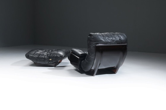 Image 1 of Rara poltrona e pouf Marsala in pelle nera - Michel Ducaroy - Ligne Roset