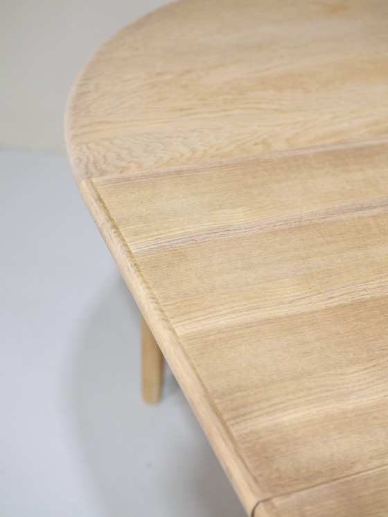 Image 1 of Extendable dining table Henning Kjaernulf oak Danish