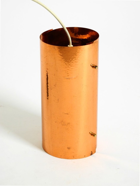 Image 1 of Two rare mid-century tube pendant lamps consisting of two screwed-together copper bowls