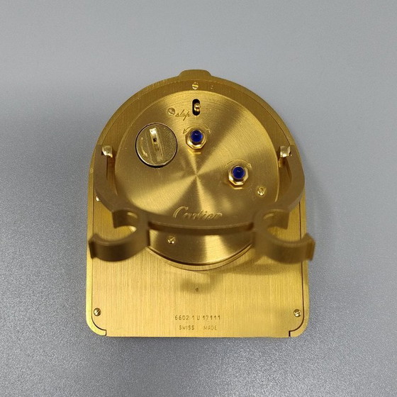 Image 1 of Cartier "Romane" reis- en bureauwekker uit de jaren 80, verguld met 18 karaats goud, inclusief originele doos en papieren.