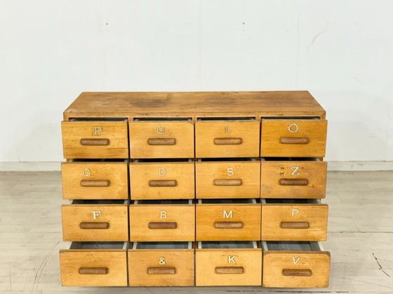 Image 1 of Beautiful vintage apothecary cabinet / compartment cabinet on casters – 16 compartments