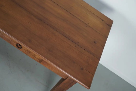 Image 1 of Early 20th-century French rustic country dining table made of fruitwood