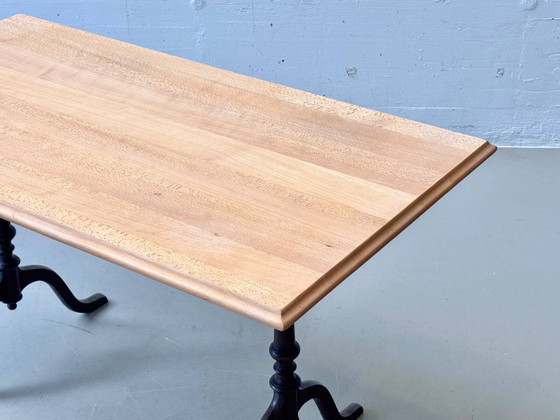 Image 1 of Horgen Glarus baraktafel gemaakt van beukenhout met gietijzeren poten