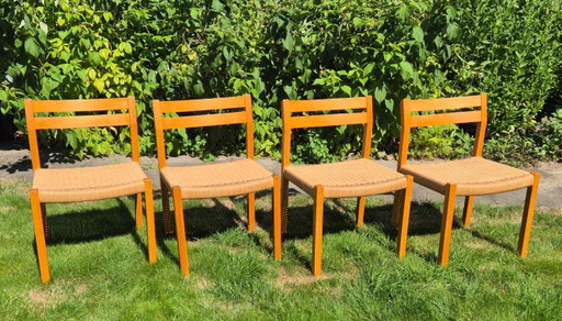 4 Stuks J.L. Møller Model 401 eikenhouten eetkamerstoelen met papercord zitting