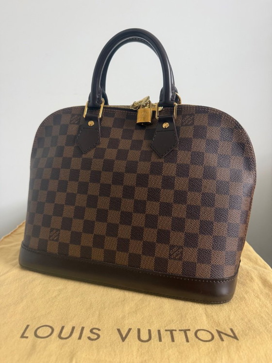Bolso Louis Vuitton Alma PM – Damier Ebene | De segunda mano | Set completo de coleccionista – Bolsos de mano (photo 2 of 22)