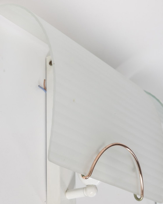 Image 1 of  Pagina 1 di 9 Coppia di lampade da parete vintage anni '80 in vetro decorato di design italiano