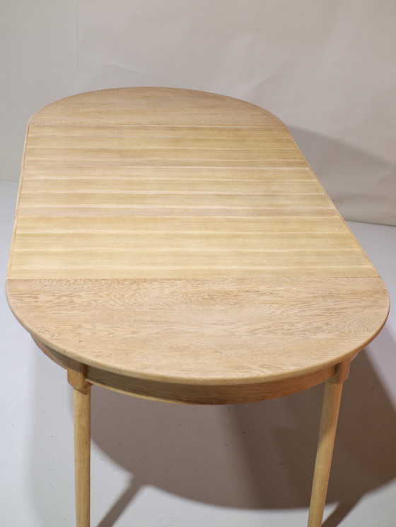 Image 1 of Extendable dining table Henning Kjaernulf oak Danish