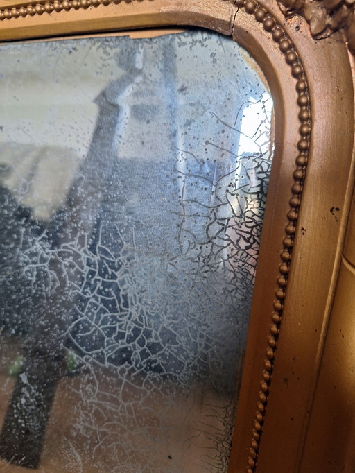 Old mirror with weathered glass / patina