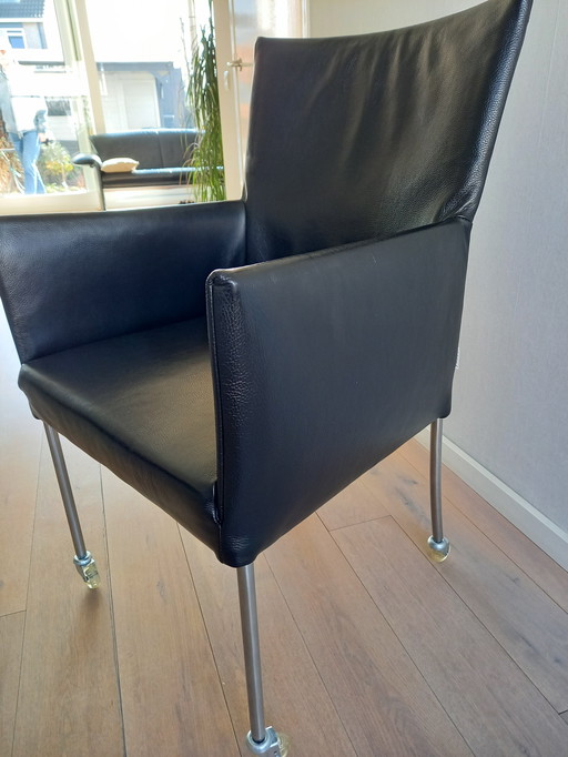 4 Black Leather Chairs On Wheels, Arc By Bert Plantagie