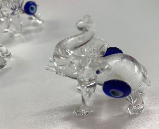 Image 1 of Famiglia di elefanti dagli occhi azzurri in confezione regalo