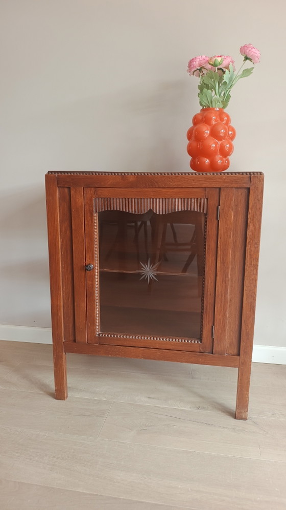 Image 1 of Bellissima vetrina in stile Art Déco della scuola di Amsterdam.