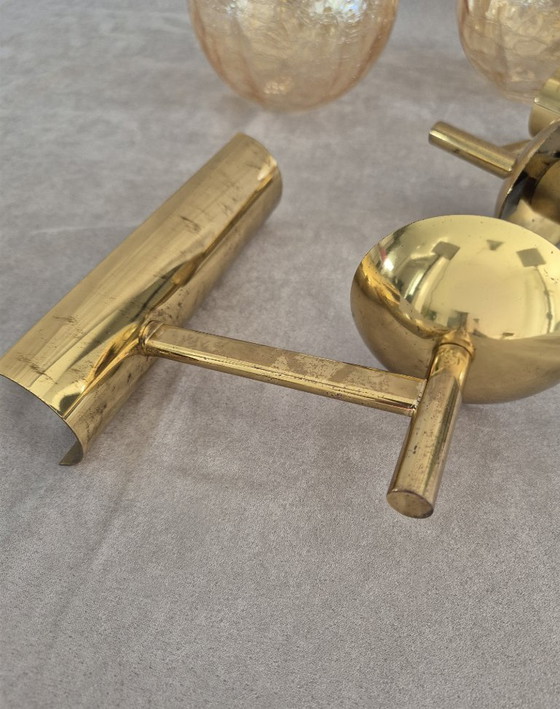 Image 1 of Set van twee Fischer 724/1 messing wandlampen met craquelé glazen bol, mid-century stijl, E14 fitting.