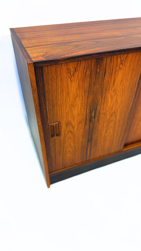 Image 1 of Mid century vintage Danish rosewood cabinet with sliding doors
