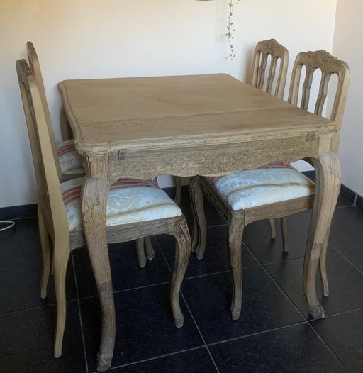 Antique table with 4 matching chairs